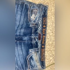 Only worn one time.  The right front pocket has some discoloring